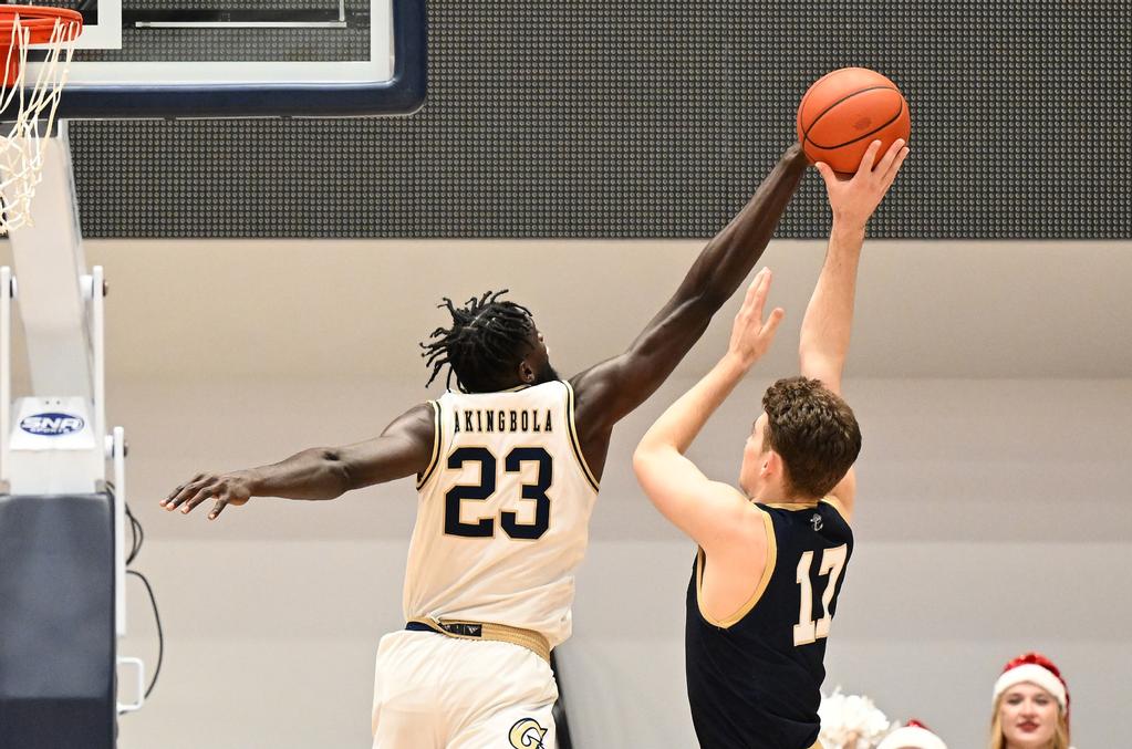 Blocks and Free Throws Steal the Show as GW Sinks Navy in OT