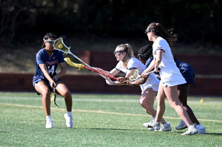 Lax Dominates Howard in Season Opener